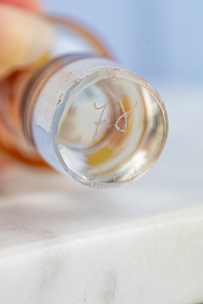 Antique Amber and Clear Glass Etched Bottle