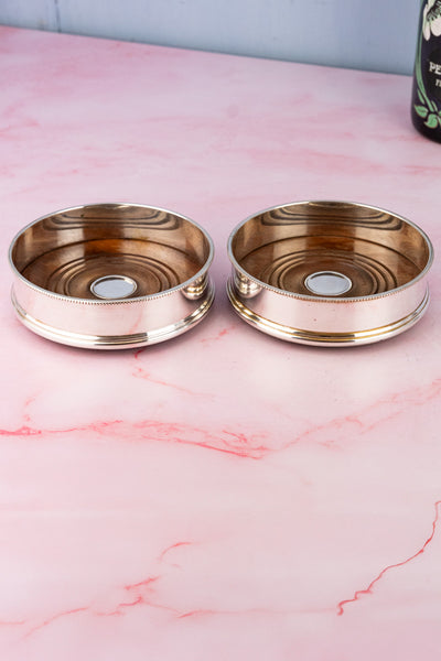 Antique Silverplate & Mahogany Bottle Coaster Pair